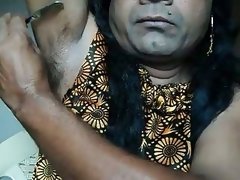Indian girl shaving armpits hair by